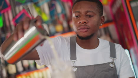 bartender pouring a drink