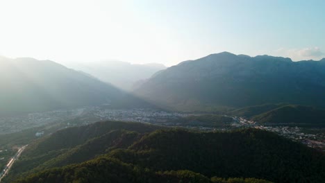 aerial 4k drone footage of a sunset over mountains near the city of
kemer