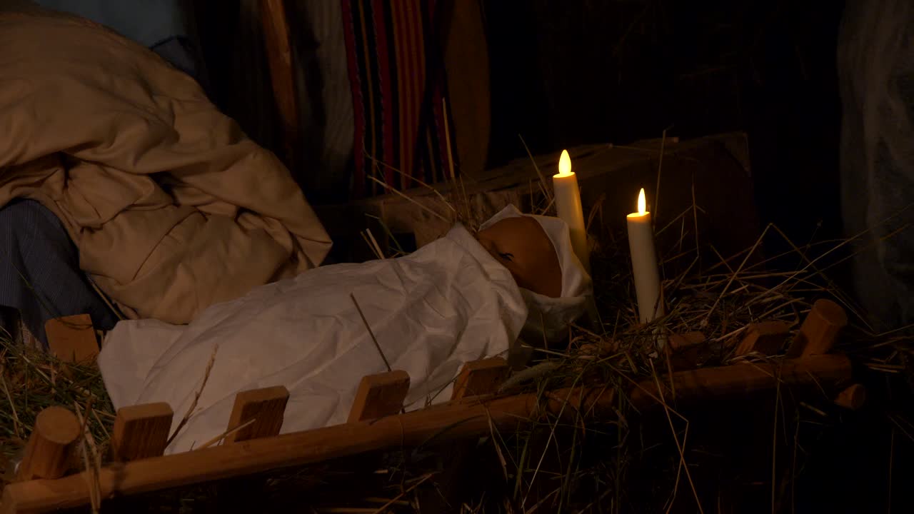 Jesus in manger cradle at night, stable in Bethlehem