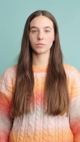 woman expressing different emotions with closed and open eyes