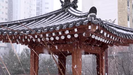 gazebo in snowfall. south korea