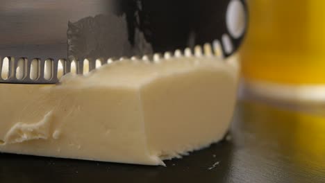 cutting butter with a knife