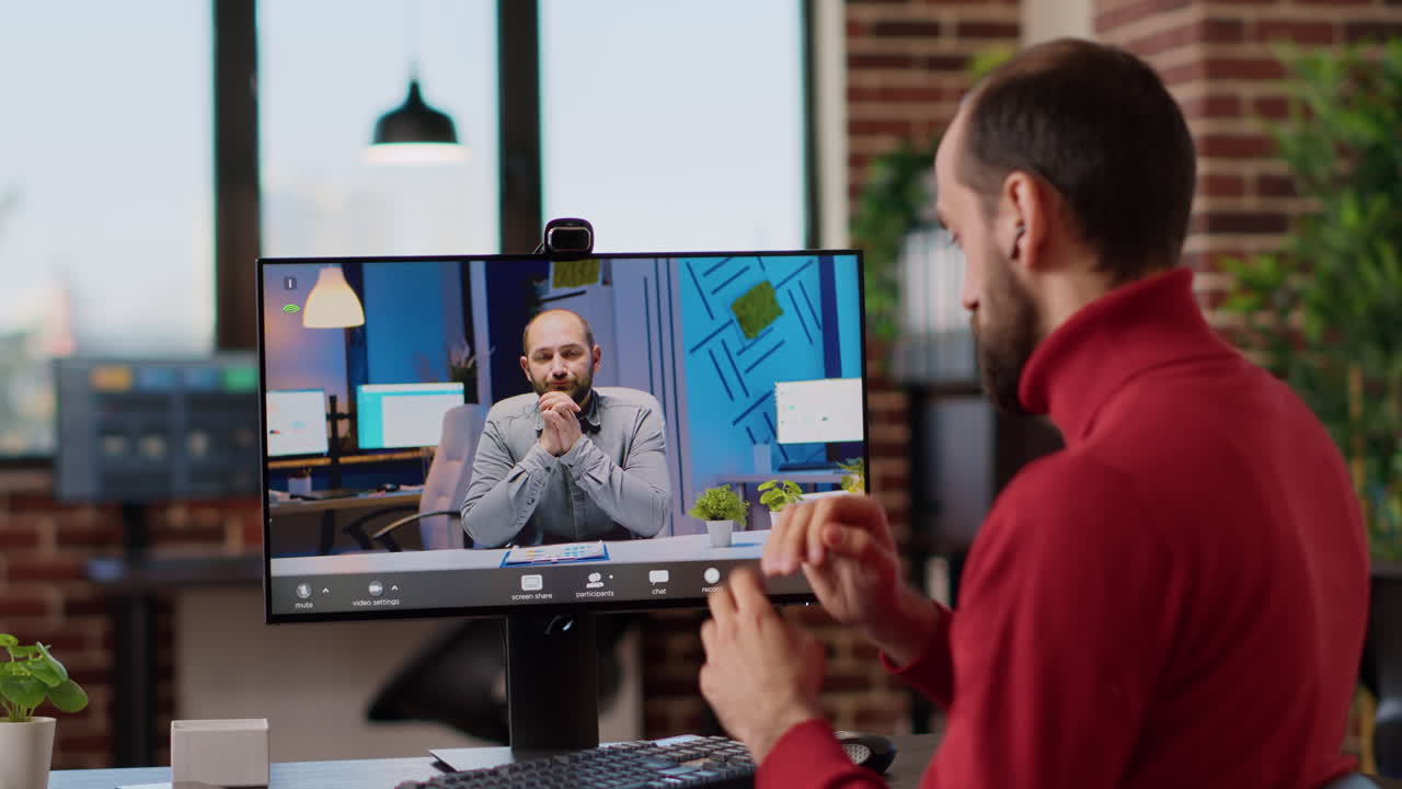 Company employee using online videocall conference
