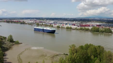 Vehicles-Carrier-Vessel-Cruising-In-The-Fraser-River-Near-Richmond-In-BC,-Canada