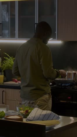 person cooking in the kitchen