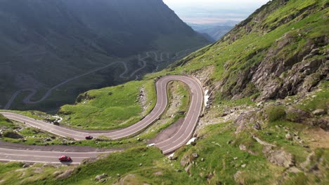 cinematic drone aerial 4k video over transfagarasan mountain road in carpathian mountains romania