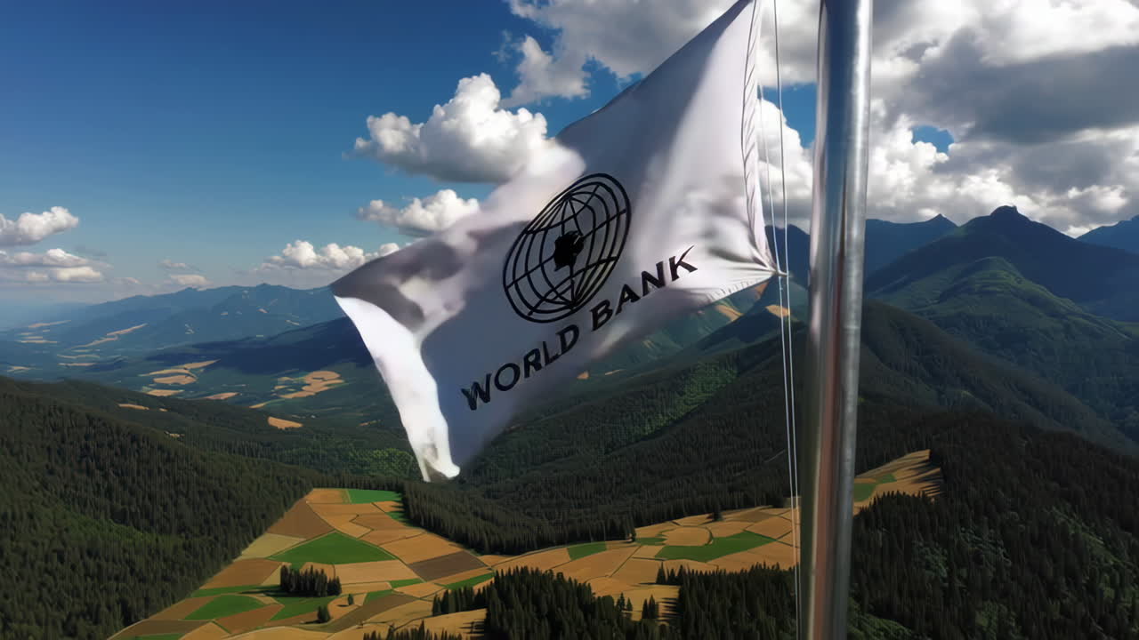 World Bank Flag Flying Over a Mountain Valley