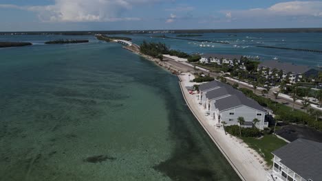 beautiful aerial view of boca grande, its magnificent beach and town in florida with waterfront homes and real estate