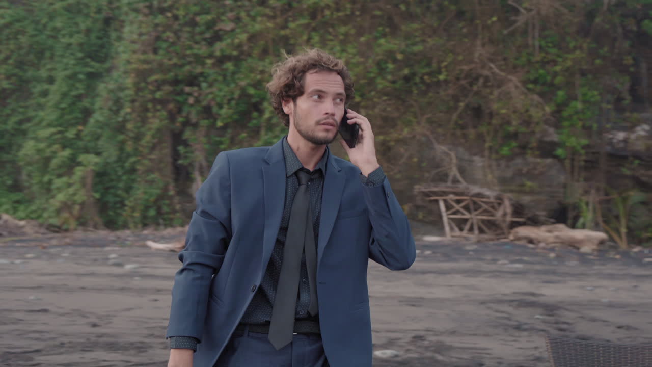 Businessman Working At Ocean Coast