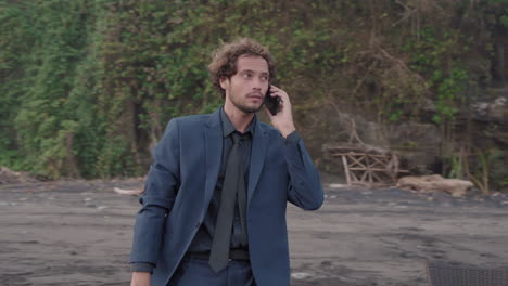 businessman working at ocean coast