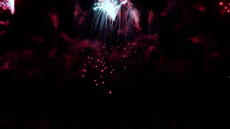 colorful fireworks exploding in the night sky. celebrations and events in bright colors.