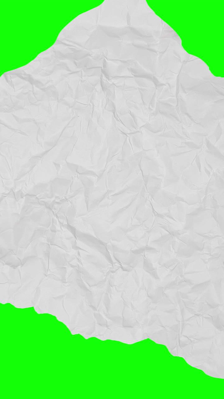 Crumpled White Paper Transitioning Over Green Screen Background