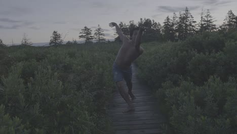 dancer on boardwalk