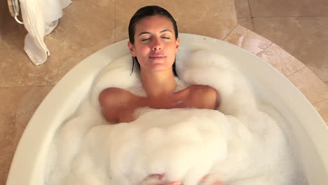 peaceful woman in her bath