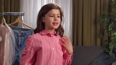 Girl Making a Heart Shape with Hands