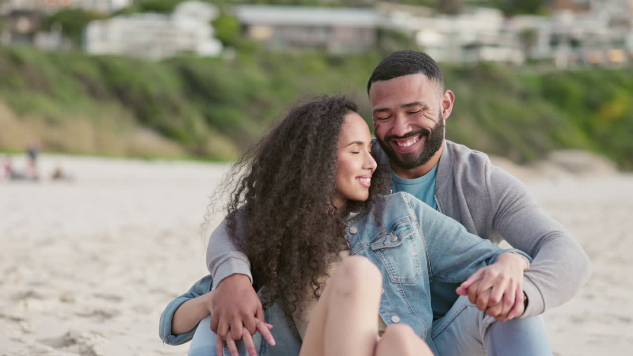 Love, hug and couple on a beach