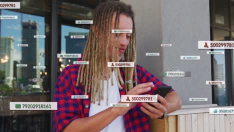 Animation of social media icons with numbers over biracial man using smartphone
