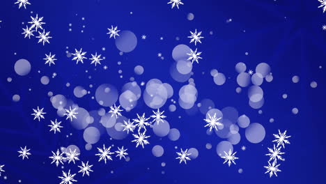 animation of snow falling over light spots at christmas, on blue background