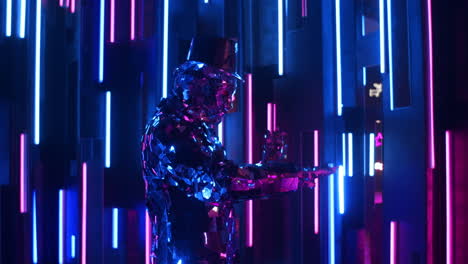 the camera follows the mesmerizing dancing of a glittering robot man on a neon wall.