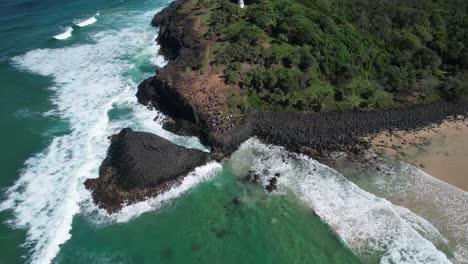 Aerial-View-Of-Fingal-Head-Causeway-With-People-On-Fingal-Headland-In-Summer