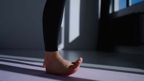 Woman doing yoga on a mat