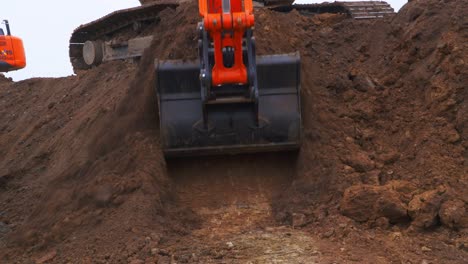 cerca de la pala excavadora apalear el suelo