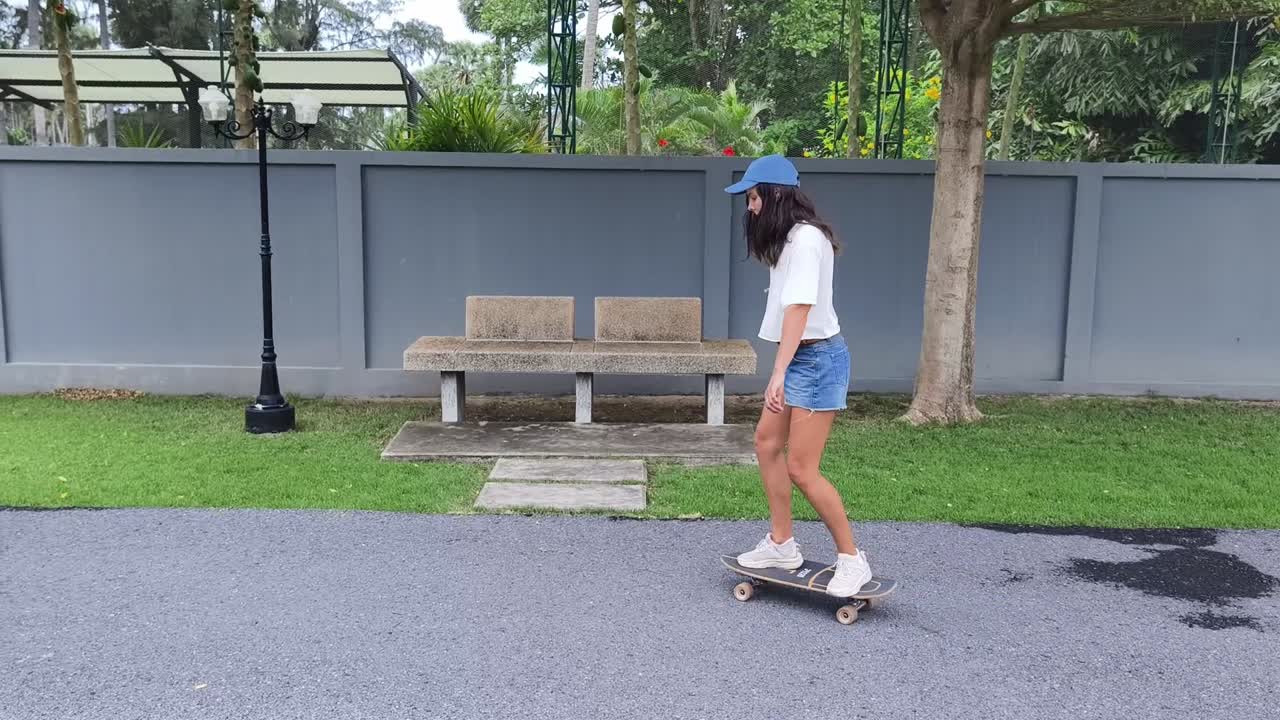 Woman Skateboarding in Park
