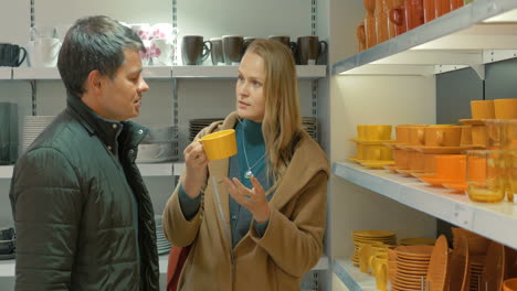 couple in utensil shop