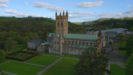 big cinematic shot of a cathedral in buckfast, england during sunny day