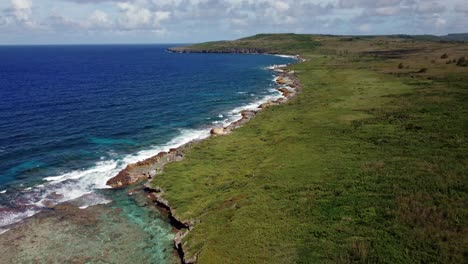 Aerial-view-of-coastline-at-Tinian-island,-Northern-Mariana-Islands