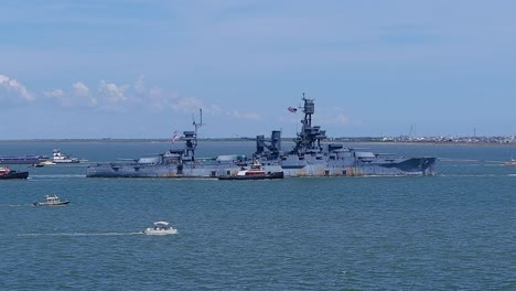 Aerial-View-of-Battleship-Texas-being-moved-on-August-31,-2022-to-Galveston,-Texas