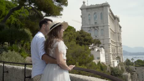 couple enjoying the view of the oceanographic museum in monaco