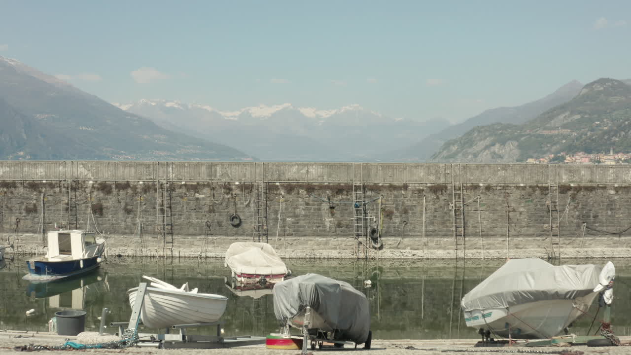 Boats in Bellagio, Lake Como, in Italy, from a Drone