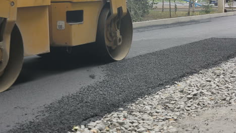 tracked paver at asphalt