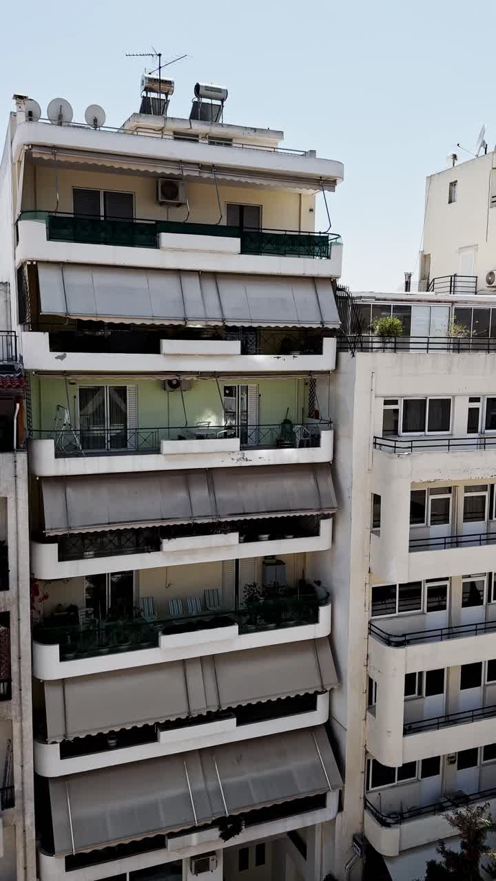 Mediterranean Apartment Building Exterior with Balconies