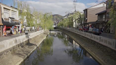 kinosaki onsen canal in slow motion, peaceful old fashioned town in hyogo japan