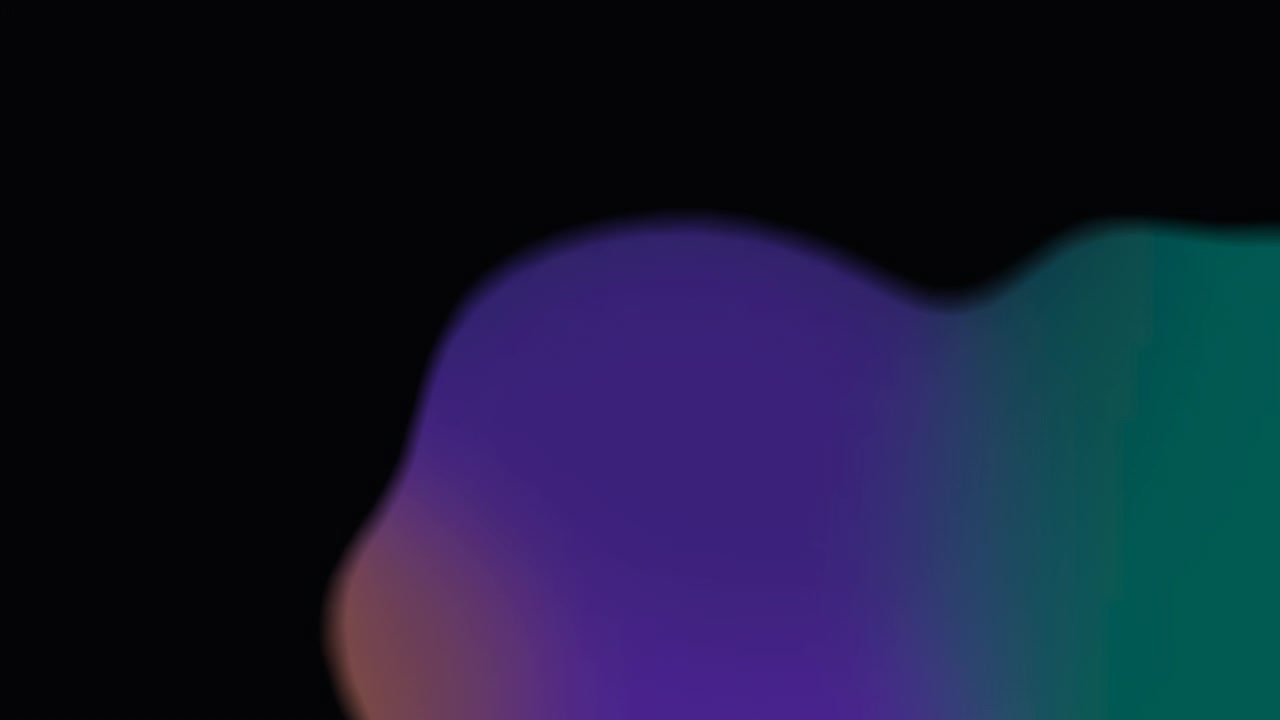 Abstract Motion of Colorful Blurred Light Orbs on Black Background
