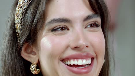 Close-up-of-the-cheerful-smiling-face-of-a-beautiful-young-lady