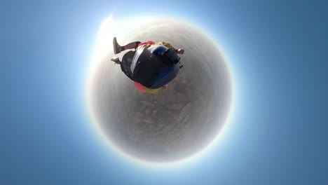 salto en tándem de 360 grados