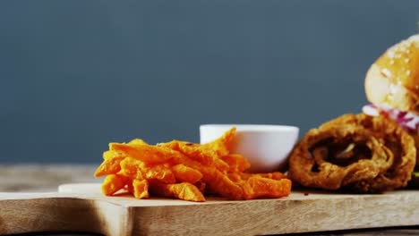 Snacks-arranged-on-chopping-board