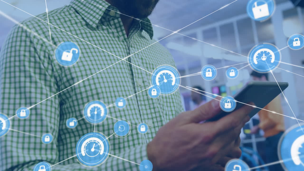 Animation of network of connections with icons over biracial man using tablet