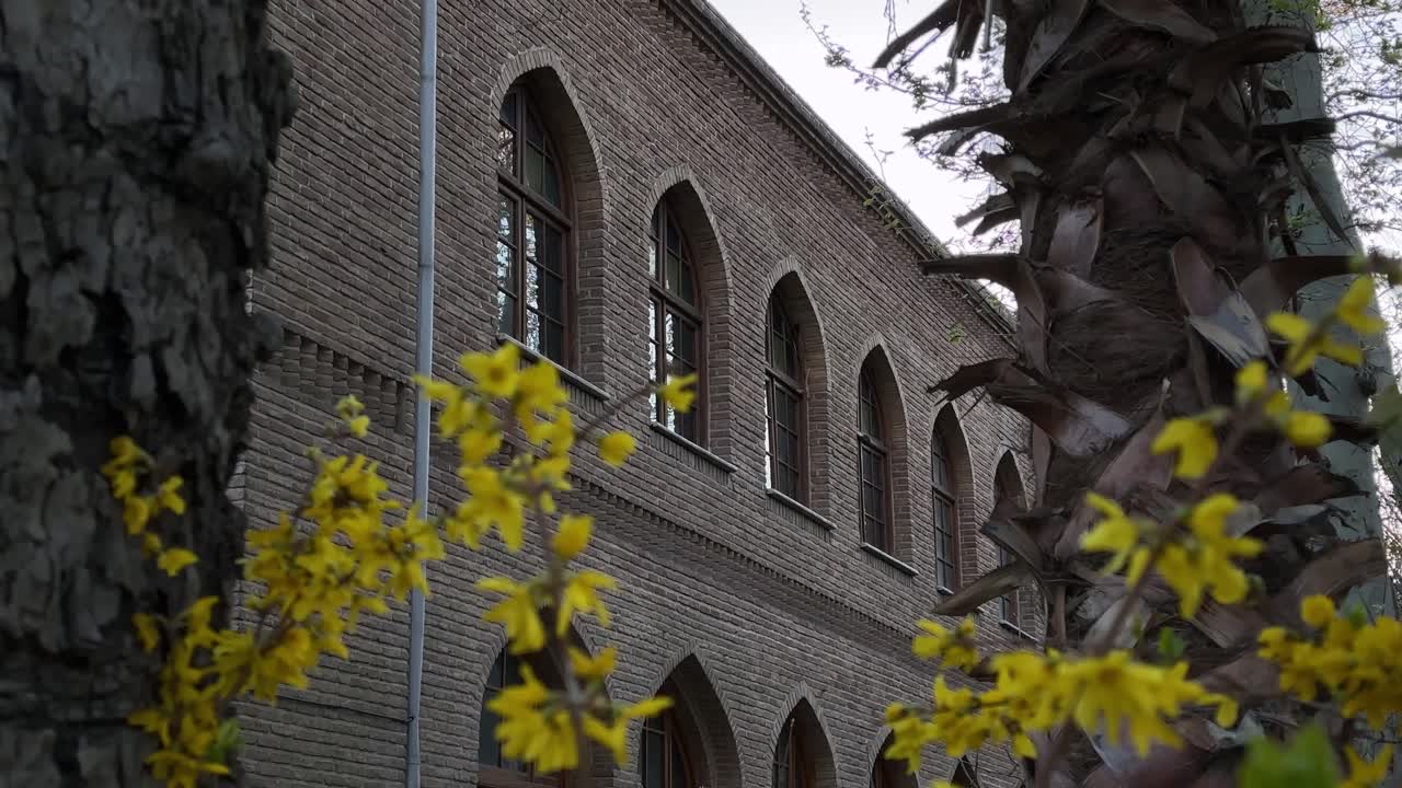 Ancient adobe house brick construction of pavilion in tehran urban landscape desert hills oasis sunny garden palm trees scenery vacation tourism spring season isfahan Iran nature travel destination
