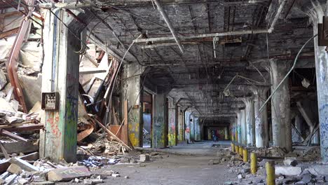 interior of an abandoned and collapsing automobile manufacturing factory in detroit michigan