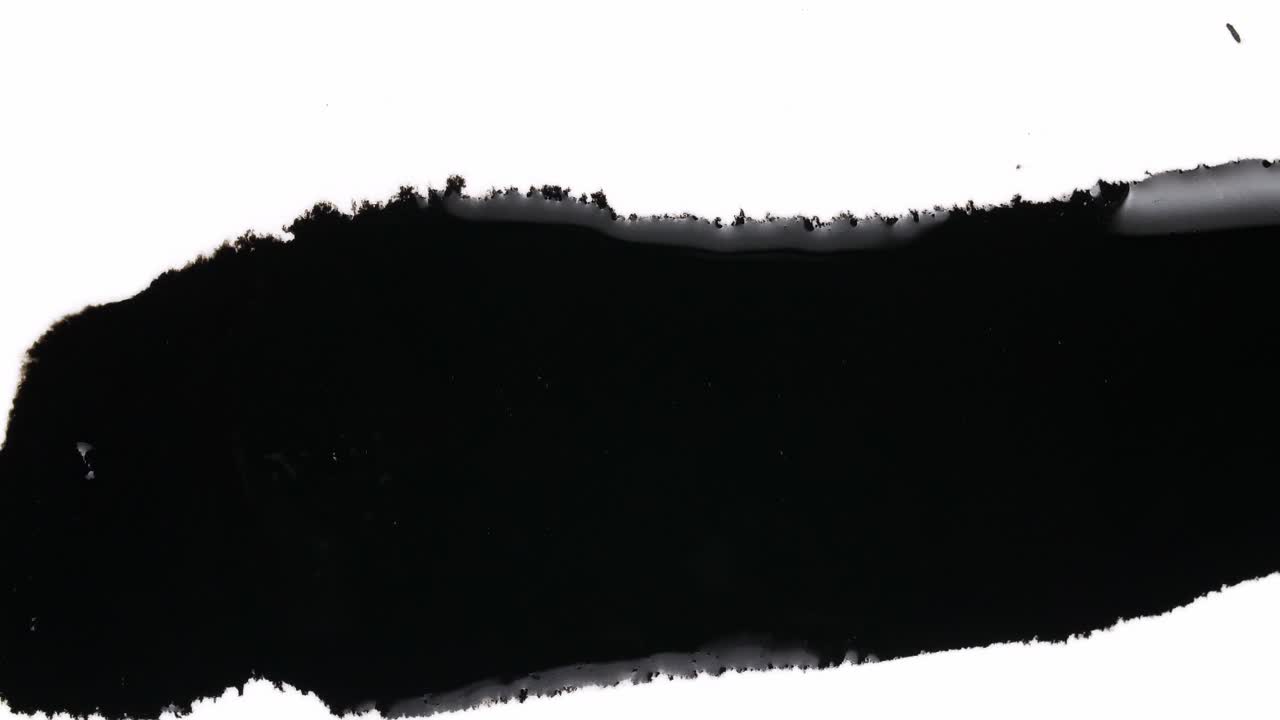 Black Ink Drops On White Background