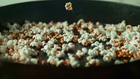 popcorn popping in a pan