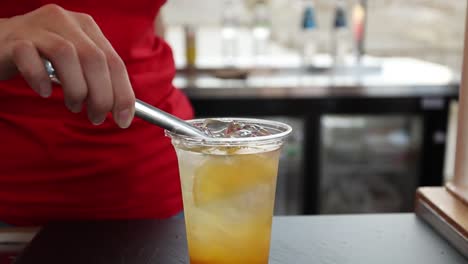 woman serving a refreshing summer drink