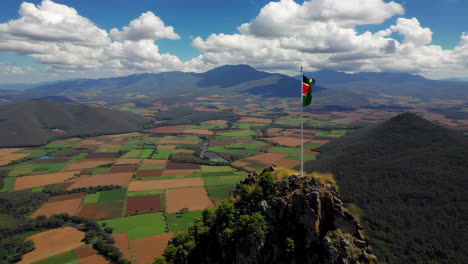 kenya flag on a mountaintop, aerial view