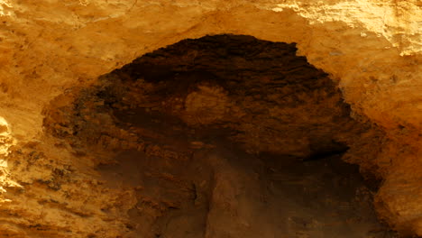 outside of a cave looking in