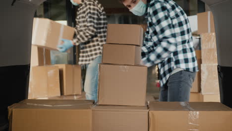 Warehouse-Staff-Unload-Boxes-Of-Medicine