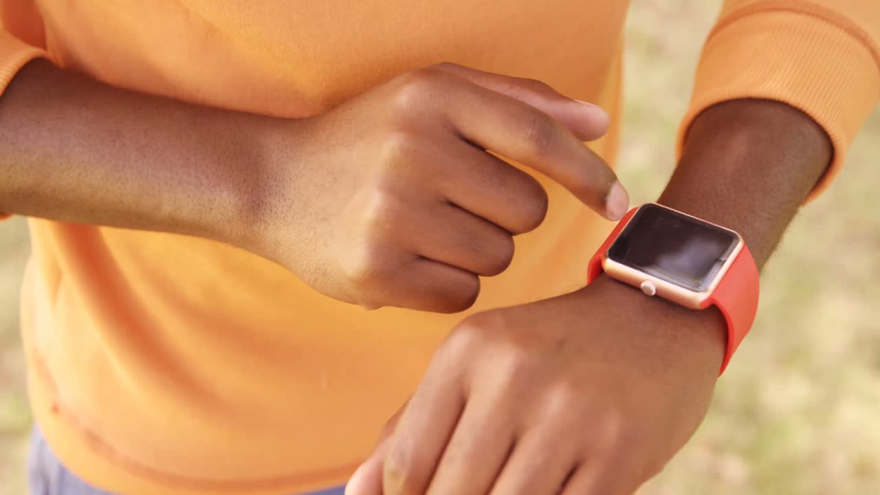Close up of a man is wearing a smart watch